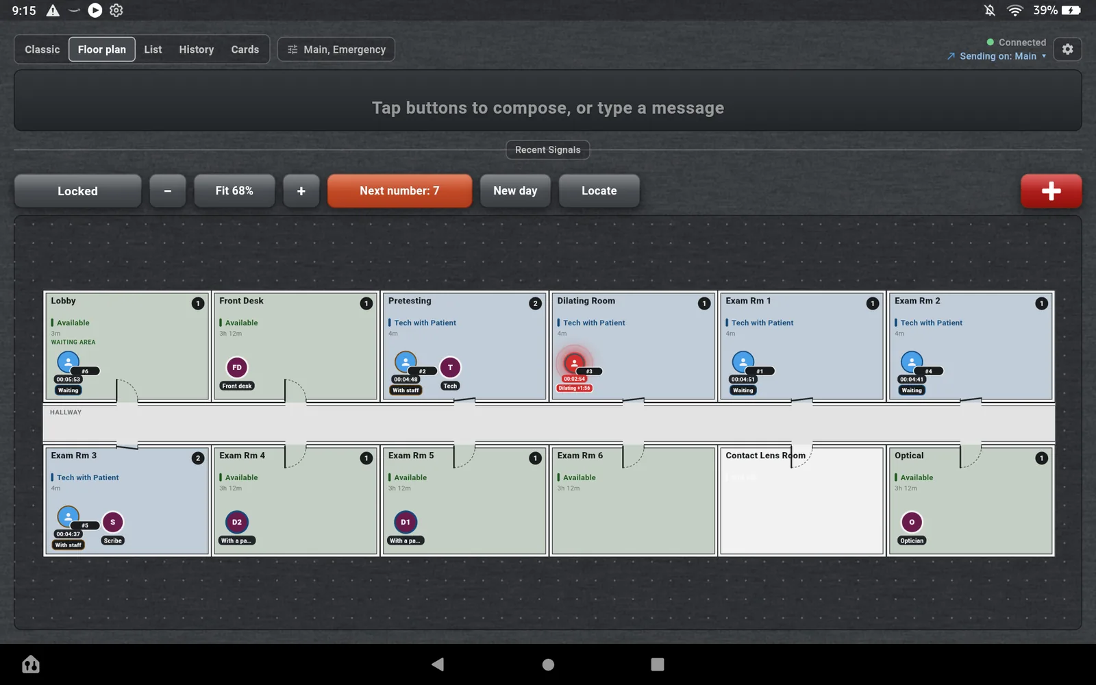 The Floor plan view on a Fire HD 10: twelve rooms drawn wall to wall around a hallway, with doors, a waiting area, guest icons with running clocks and staff icons in the rooms. One guest glows red because their timer has run out.